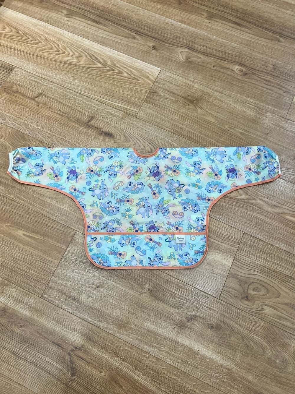 Bumkins Disney Aloha Stitch Sleeved Bib Waterproof Pocketed Tie Back